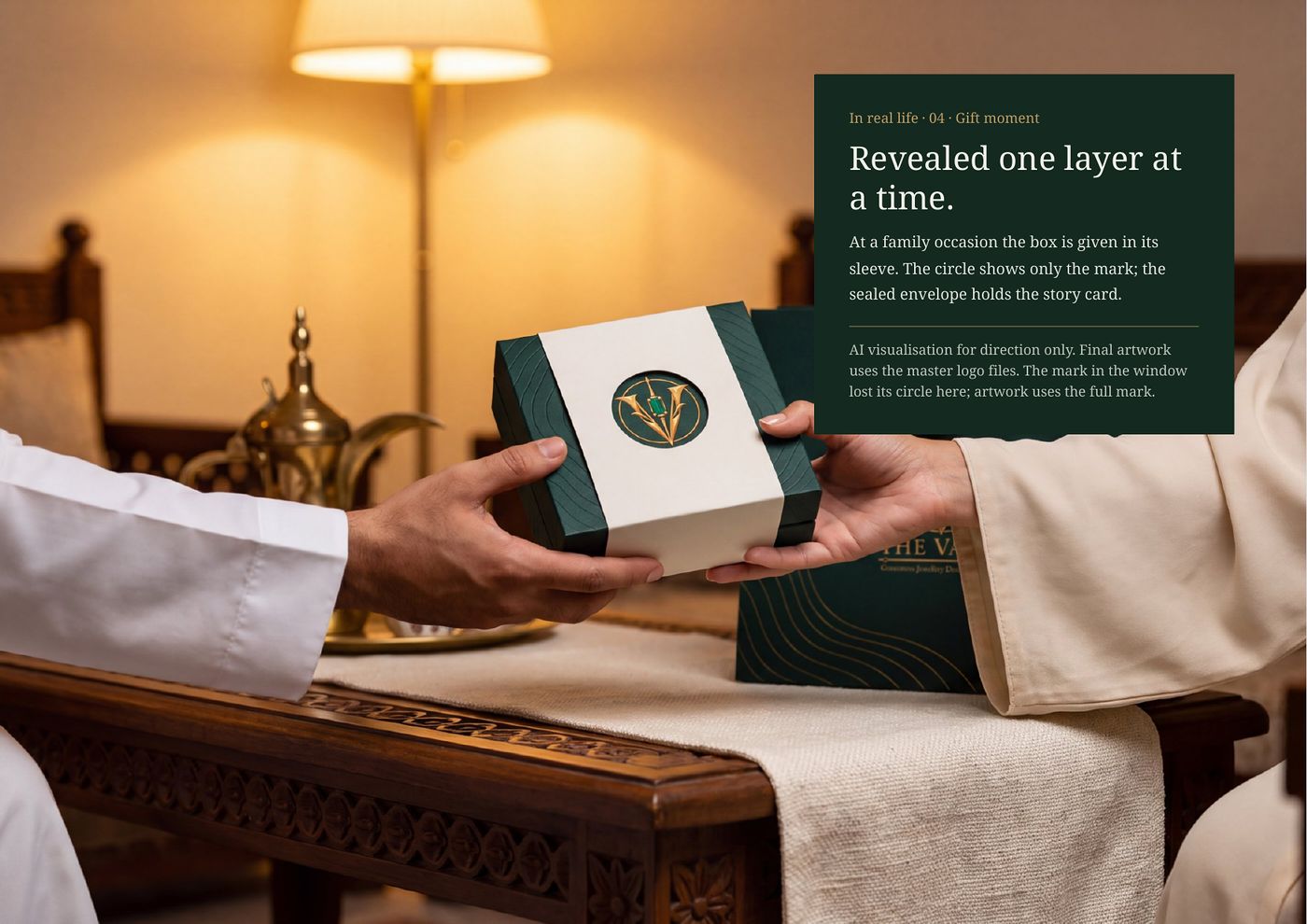 Gift moment: the box given in its ivory sleeve, the mark showing through the circle
